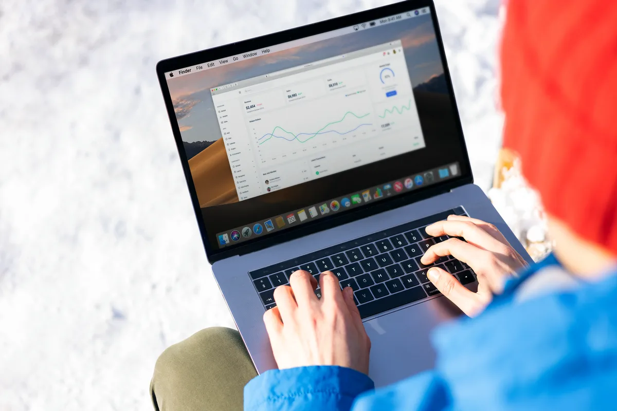 A virtual assistant reviewing an Amazon seller dashboard on a laptop